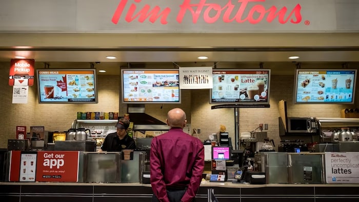 The lawsuit names Tim Hortons' Canadian franchisor TDL Group Corp. and Huntsville, Ont., franchise owner Greenwood Enterprises Inc. as defendants. The two companies deny all allegations contained in Lansing's statement of claim. (Evan Mitsui/CBC)