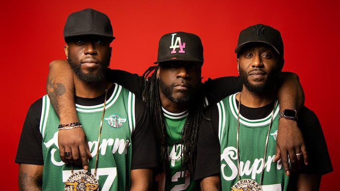 Portrait de trois hommes.