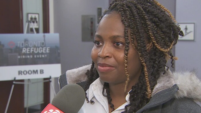 Anita Johnson, a refugee from Nigeria who has been in Canada for two years, says: 'If you don't have the Canadian experience, it's a little bit difficult to get something in your field.' (CBC)