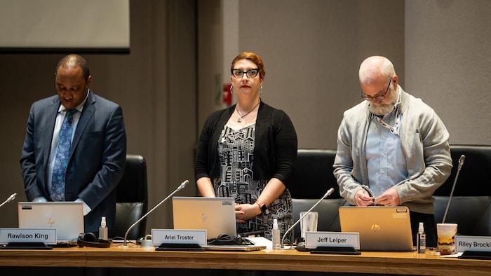 Ariel Troster is standing at her headquarters around the Ottawa municipal council table.