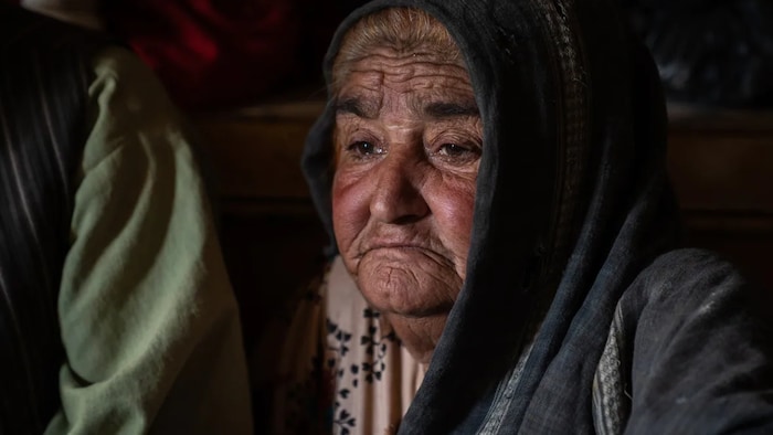 Babuo, a 75-year-old mother and grandmother, mourns the death of one of her sons, a Taliban fighter. He died in the last few months of the war, she said, killed in an airstrike. He left behind seven children in a poor village in Panjwaii.