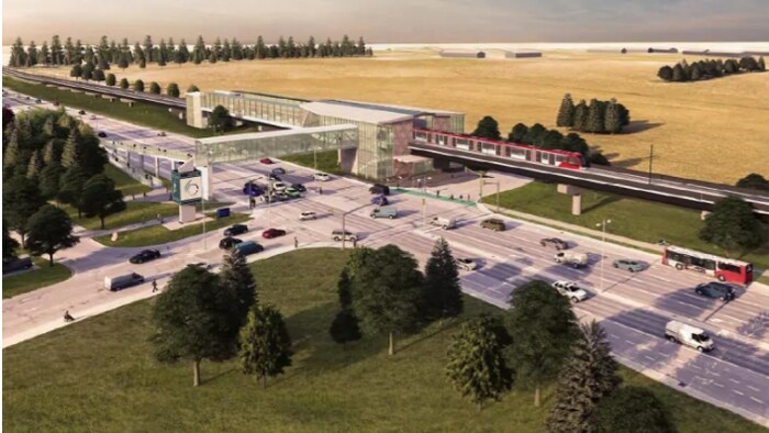 Un coin de rue surplombé par les rails du train léger et une de ses stations.