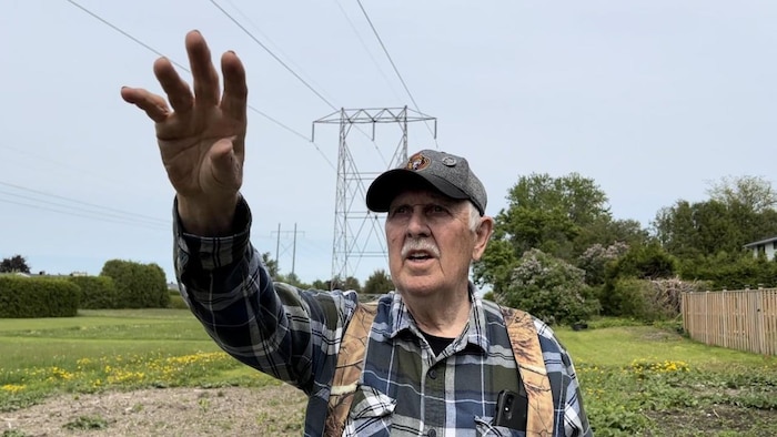Bob Scott describes the 2018 tornado moving along the hydro corridor behind his home on Aurora Crescent.
