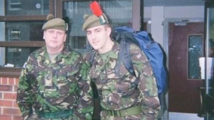 Mitchell, right, in an undated photo from his time in the British Army, which he left in 2007. ( ukraine_tbic/Instagram)