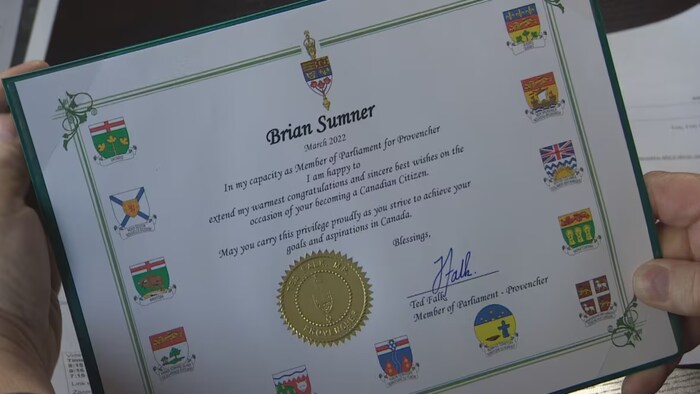 Brian Sumner received this certificate in the mail from his local MP, Ted Falk, shortly after his ceremony, making him believe that he had become a Canadian citizen. (Trevor Brine/CBC)