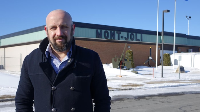 Bruno Paradis in front of Mont Joli Airport.