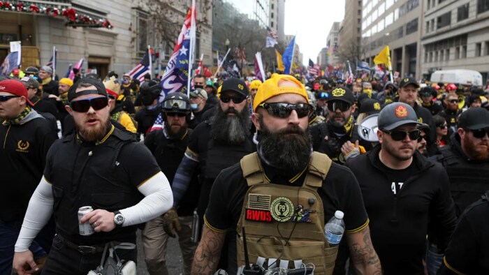 Supporters of Donald Trump and members of the far-right group Proud Boys attend a rally to protest the results of the election in Washington D.C on December 12, 2020.
