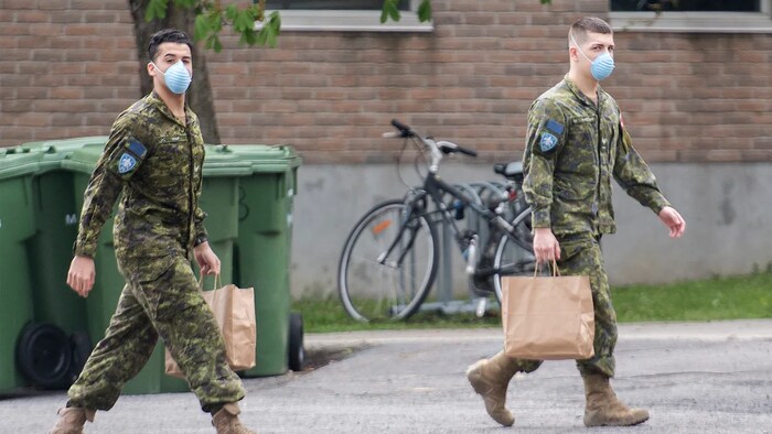 Members of the Canadian Armed Forces help with pandemic response at a long-term care home in Montreal on May 16, 2020. 
