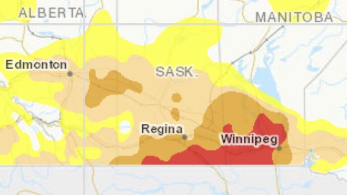 La zone rouge s'étend du sud-ouest de la Saskatchewan à l'est du Manitoba. 