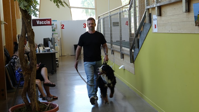 The employee James Robson who walks with his dog.