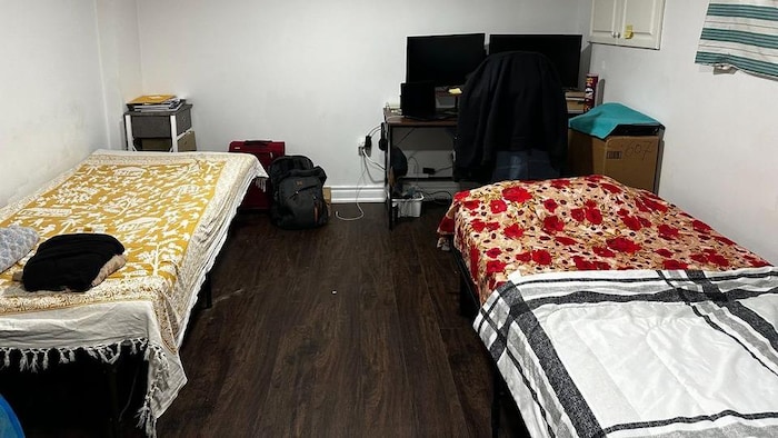 Deux lits dans une chambre à Scarborough.