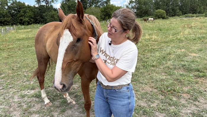 Portrait de Guylaine Beaudoin avec Wink, le cheval de Florence Harvey.