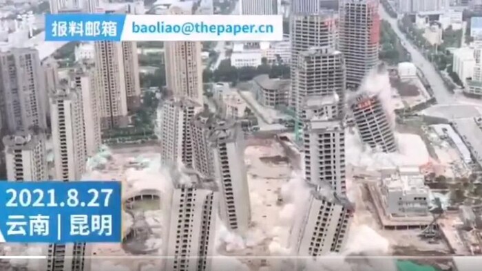 A still from video of unneeded buildings being demolished in China prompted worries that financial trouble at property giant Evergrande were a symptom of a much bigger problem.
