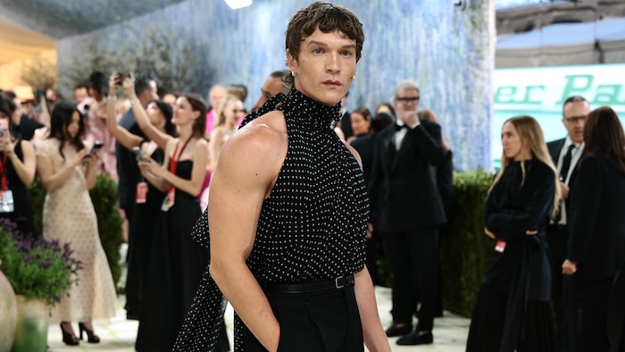 Met Gala: Celebrities parade against Jeff Bezos background.