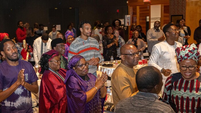 Des personnes participant à un événement organisé par le Conseil panafricain de Québec.