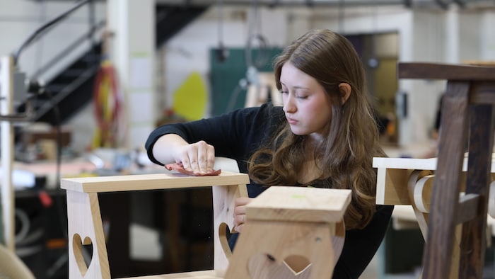 A student who pums wood. canada wants build more, but