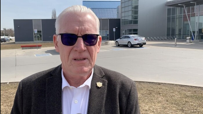 Dan McCreary wears smoked glasses