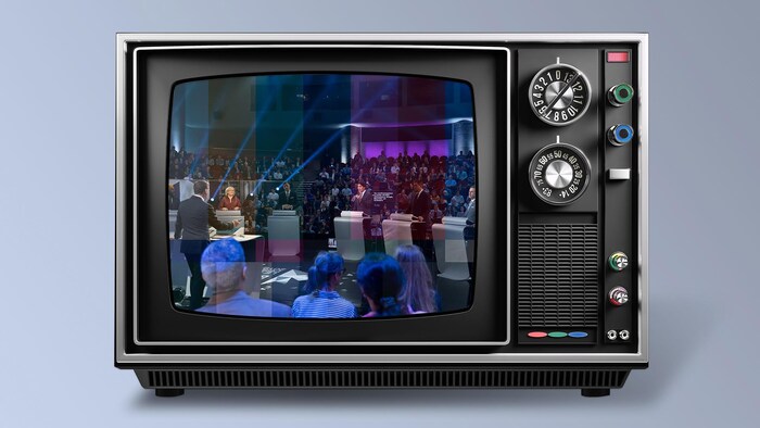 Image des 6 chefs de parti dans l'écran d'un téléviseur