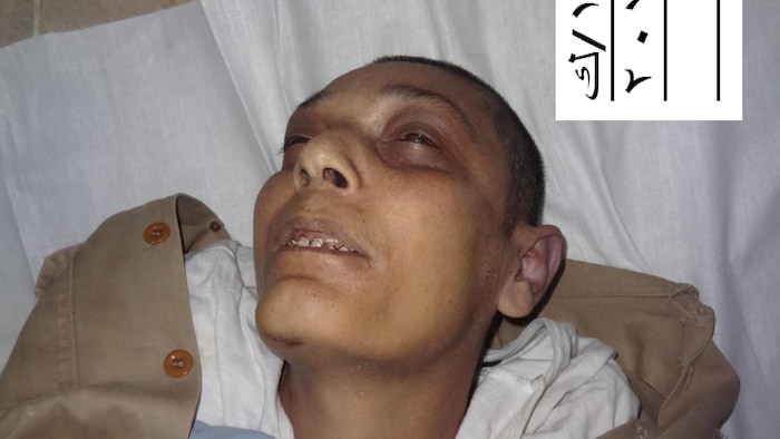 Le corps sans vie du dissident syrien Mazen Al-Hamada pris en photo par l’Unité de préservation des preuves de la police militaire de Damas.