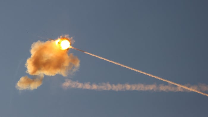 A missile explodes in the air.