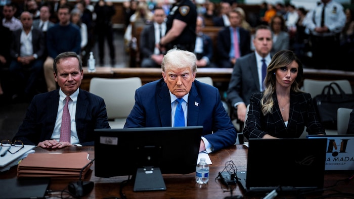 A scowling Donald Trump attends the trial. 