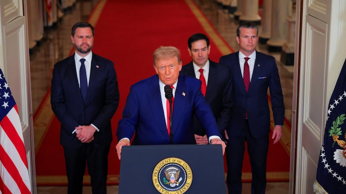 Donald Trump gives a speech, with three men behind him. weakened iranian regime, but not