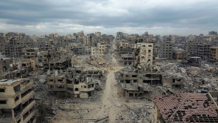 Drone footage shows destruction in Gaza City. We see many destroyed or damaged buildings. 