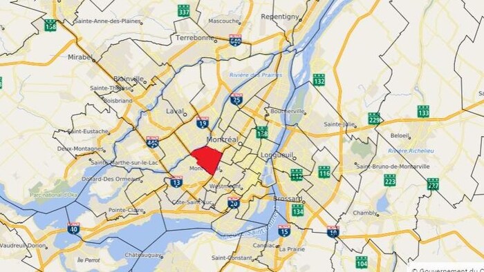 La circonscription d'Acadie est marquée en rouge et est située au centre de l'île de Montréal.  