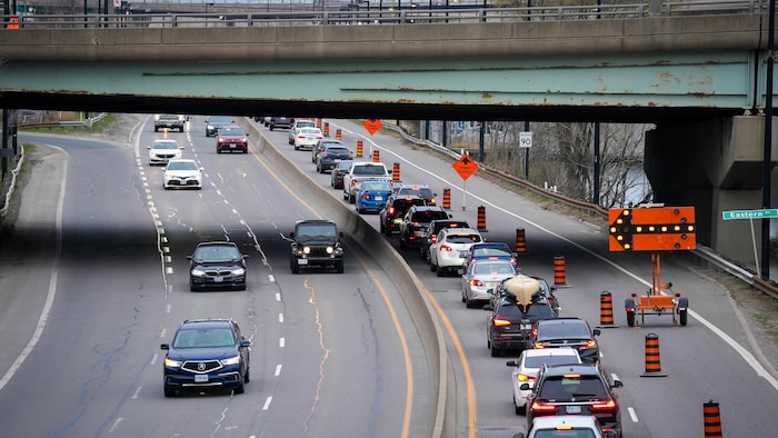 Cars drive on the Don Valley Parkway, in Toronto, on May 6. While the COVID-19 pandemic did give some workers more flexibility with commutes, there hasn't yet been a large downturn in demand due to high gas prices.