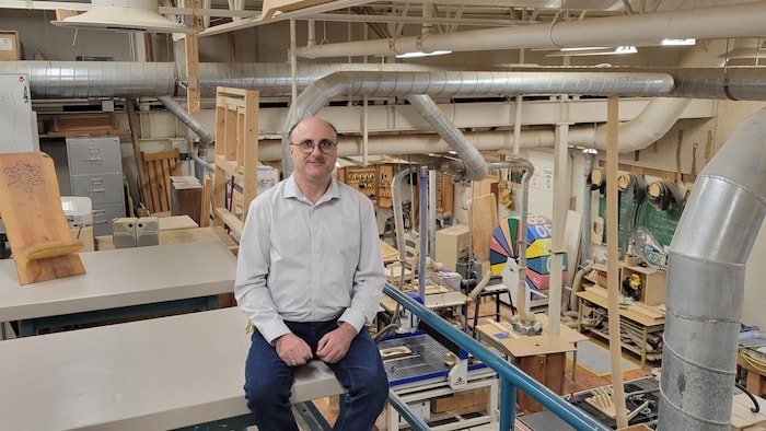 Andy Strothotte, sitting in a school workshop. canada wants build more, but