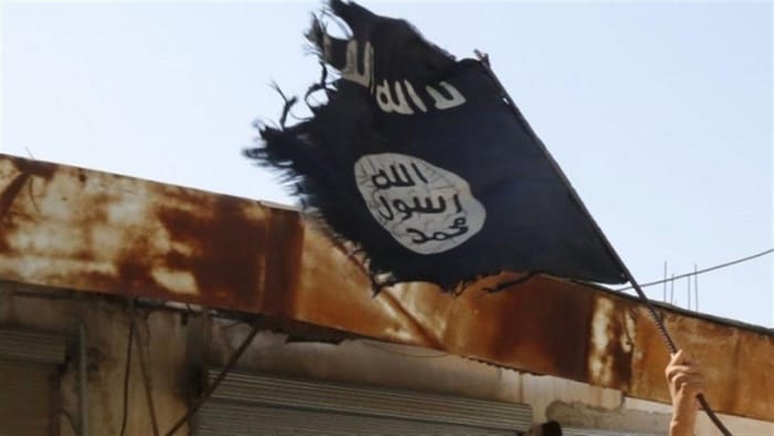 العلم الأسود لتنظيم الدولة الإسلامية في العراق والشام (داعش).