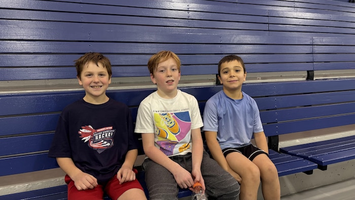 Trois participants de l'école de hockey de Francis Verreault-Paul