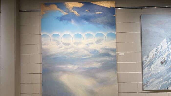 Peinture de Michel Saint Hilaire représentant un paysage et des cercles.