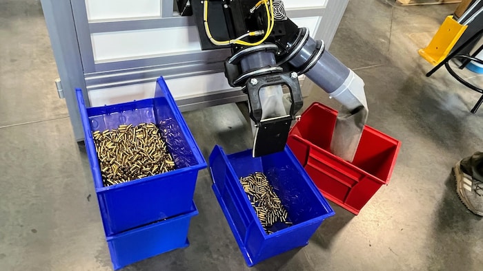 Ammunition being produced by a machine