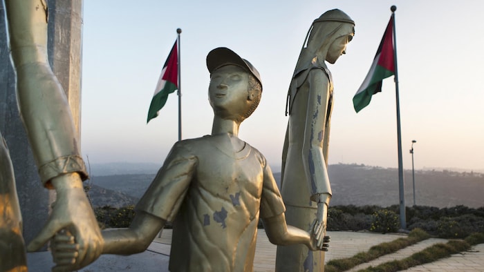 Une sculpture représentant une famille palestinienne réalisée par Nabil Anani en 2016.