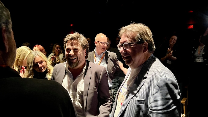 Stéphane E. Roy et Rémy Girard au Théâtre du cuivre après la projection de leur film.