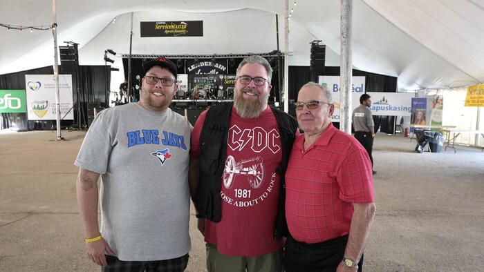 Un trio rassemblé à la St-Jean.