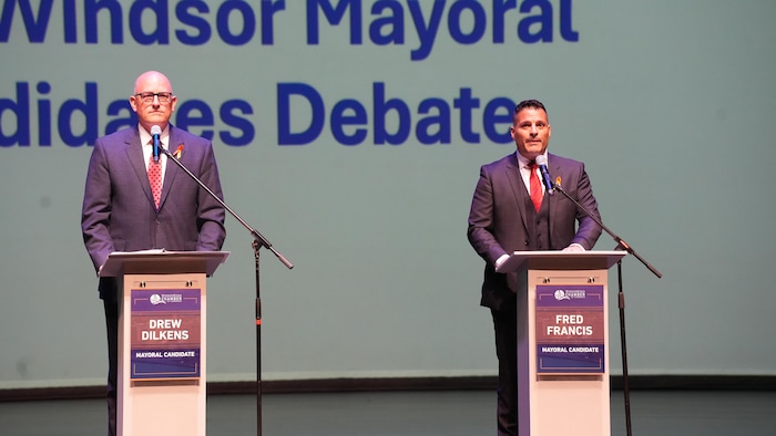 Drew Dilkens et Fred Francis pendant le débat.