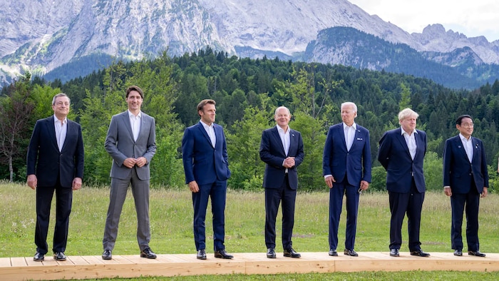 G7 leaders pose for a photo on Sunday. Left to right: Italian Prime Minister Mario Draghi; Canadian Prime Minister Justin Trudeau; French President Emmanuel Macron; German Chancellor Olaf Scholz; U.S. President Joe Biden; British Prime Minister Boris Johnson; and Japanese Prime Minister Fumio Kishida. 