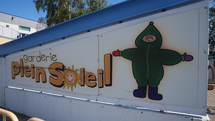 Une photo de la bannière de la Garderie Plein Soleil.