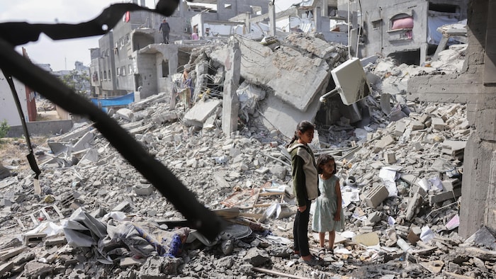 Amnistie internationale fustige un « génocide en direct » dans la bande de  Gaza | Radio-Canada