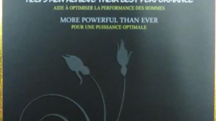 Le devant d'une boîte du produit Harmony. Il est écrit « aide à optimiser la performance des hommes » et « pour la puissance optimale ».