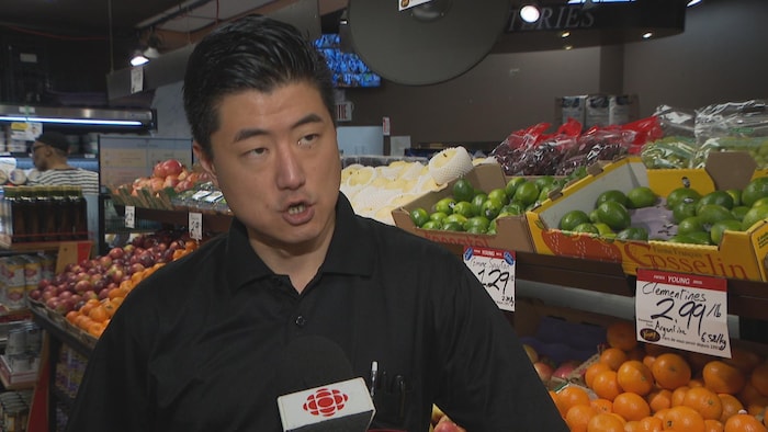 A grocer in his business.