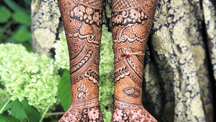 Some of Sinthusha's henna art. The henna plant is dried and turned into a paste, which is then applied to the skin.