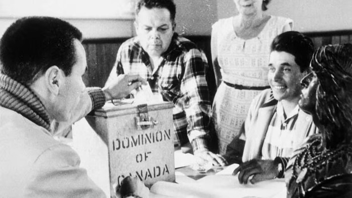 On Oct. 31, 1960, First Nations people voted in an Ontario byelection, becoming the first in Canada to exercise the newly bestowed right to vote without losing treaty status. (Nick Nickels/Library and Archives Canada/PA-123915)
