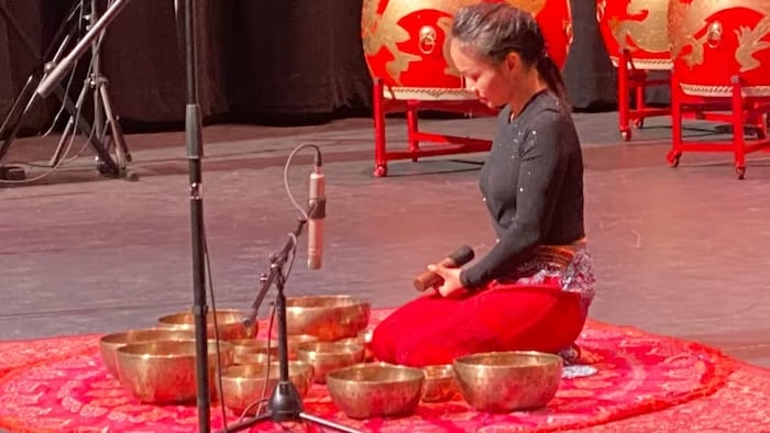 The first act of the afternoon was a Himalayan singing bowl performance. (Stacey Janzer/CBC)