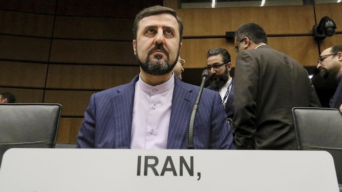 Kazem Gharibabadi awaits the start of the meeting.