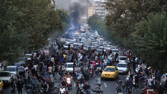 Demonstrators mass in the streets of the capital Tehran during a protest for Mahsa Amini, days after she died in police custody, on September 21, 2022.