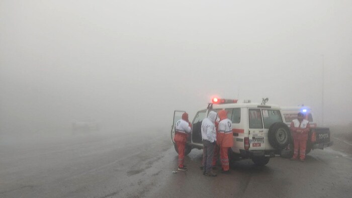 In fog, the rescue team works even if the weather is not good.