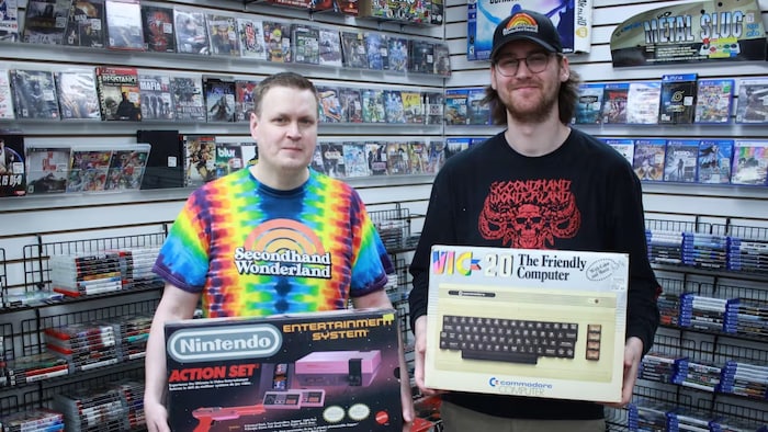 Mike Wieclawski, on the left, and Christian Crowthers, right, inside the Secondhand Wonderland store in Regina. when retro games make players